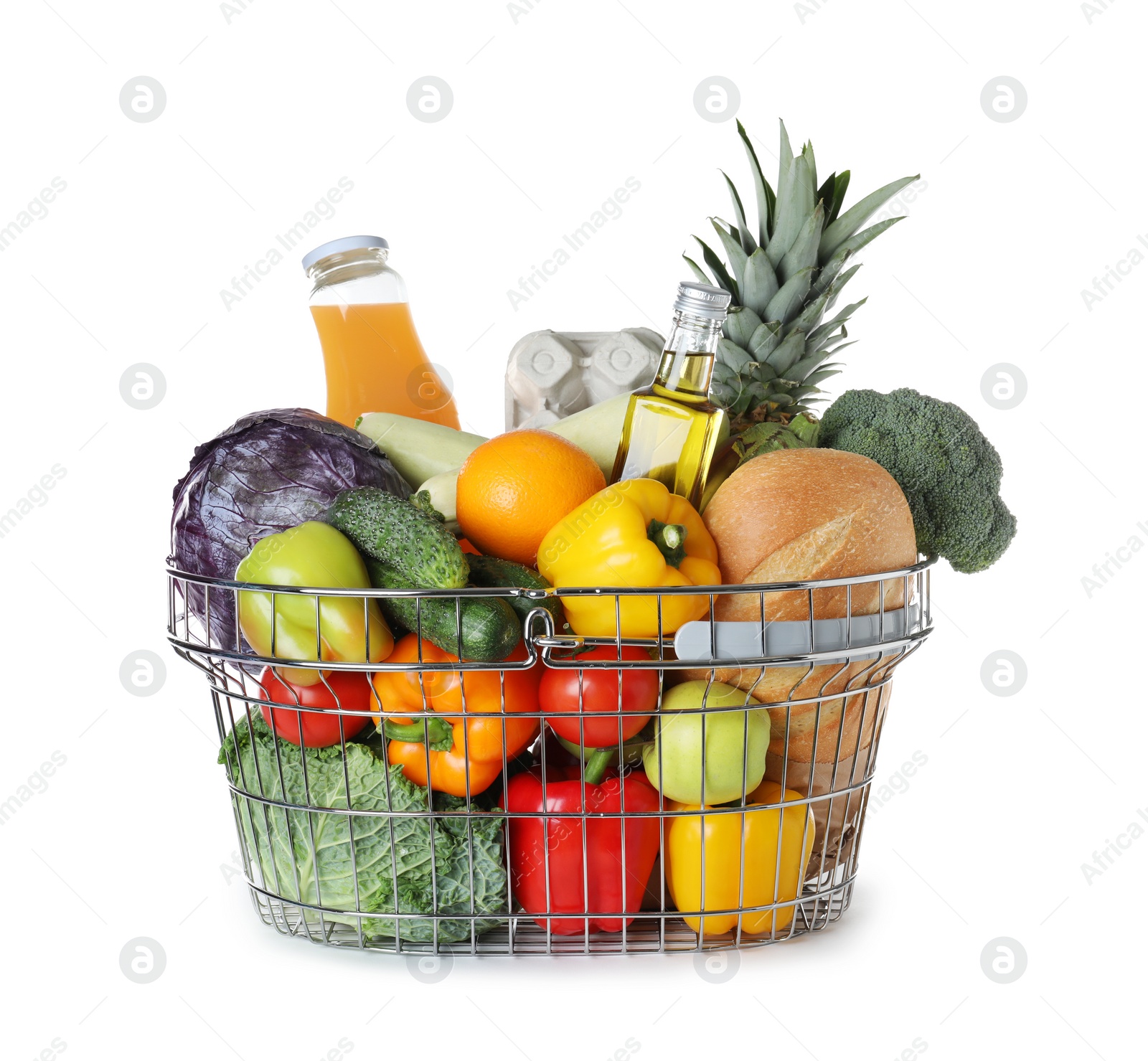 Photo of Shopping basket with grocery products on white background