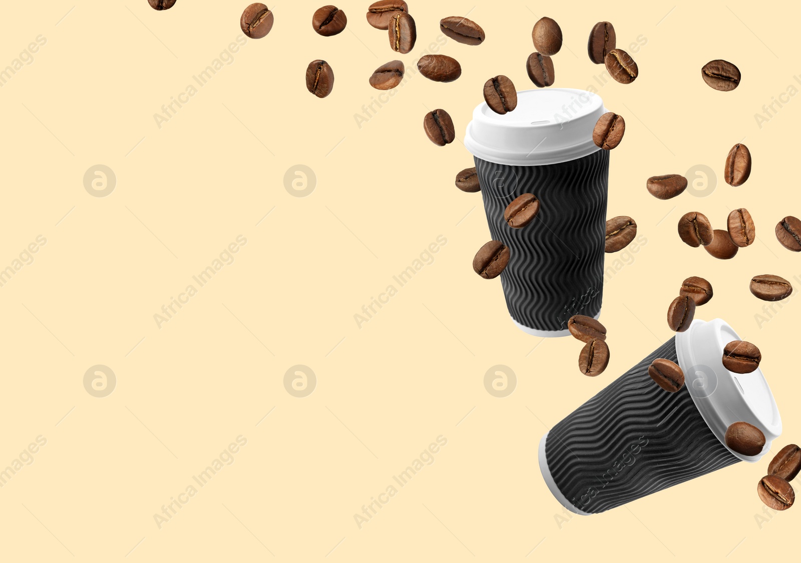 Image of Coffee to go. Paper cups and roasted beans flying on beige background, space for text