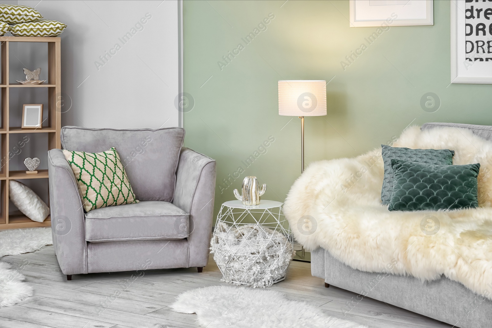 Photo of Modern room interior with cozy armchair and sofa