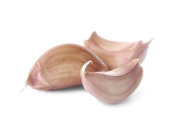 Ripe garlic cloves on white background. Organic product