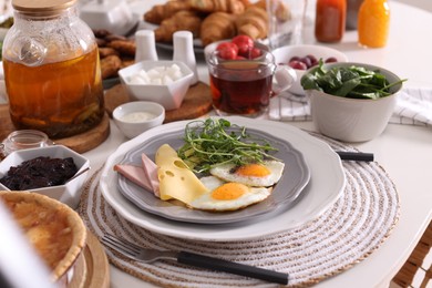 Many different dishes served on buffet table for brunch