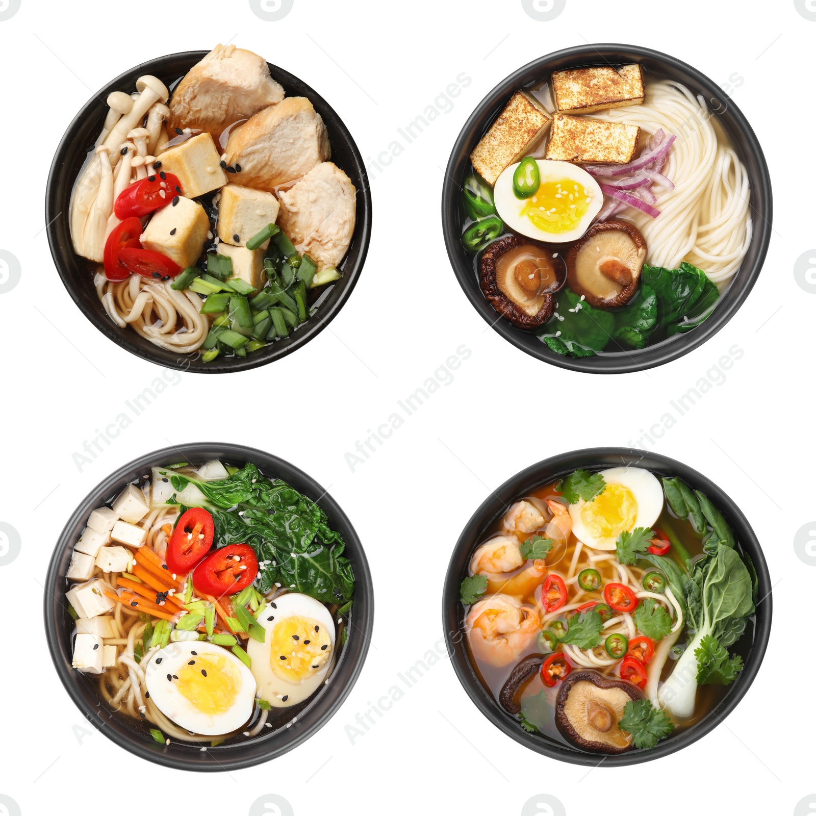 Image of Set with bowls of delicious ramen with different ingredients isolated on white, top view. Noodle soup