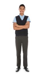 Full length portrait of African-American boy in school uniform on white background