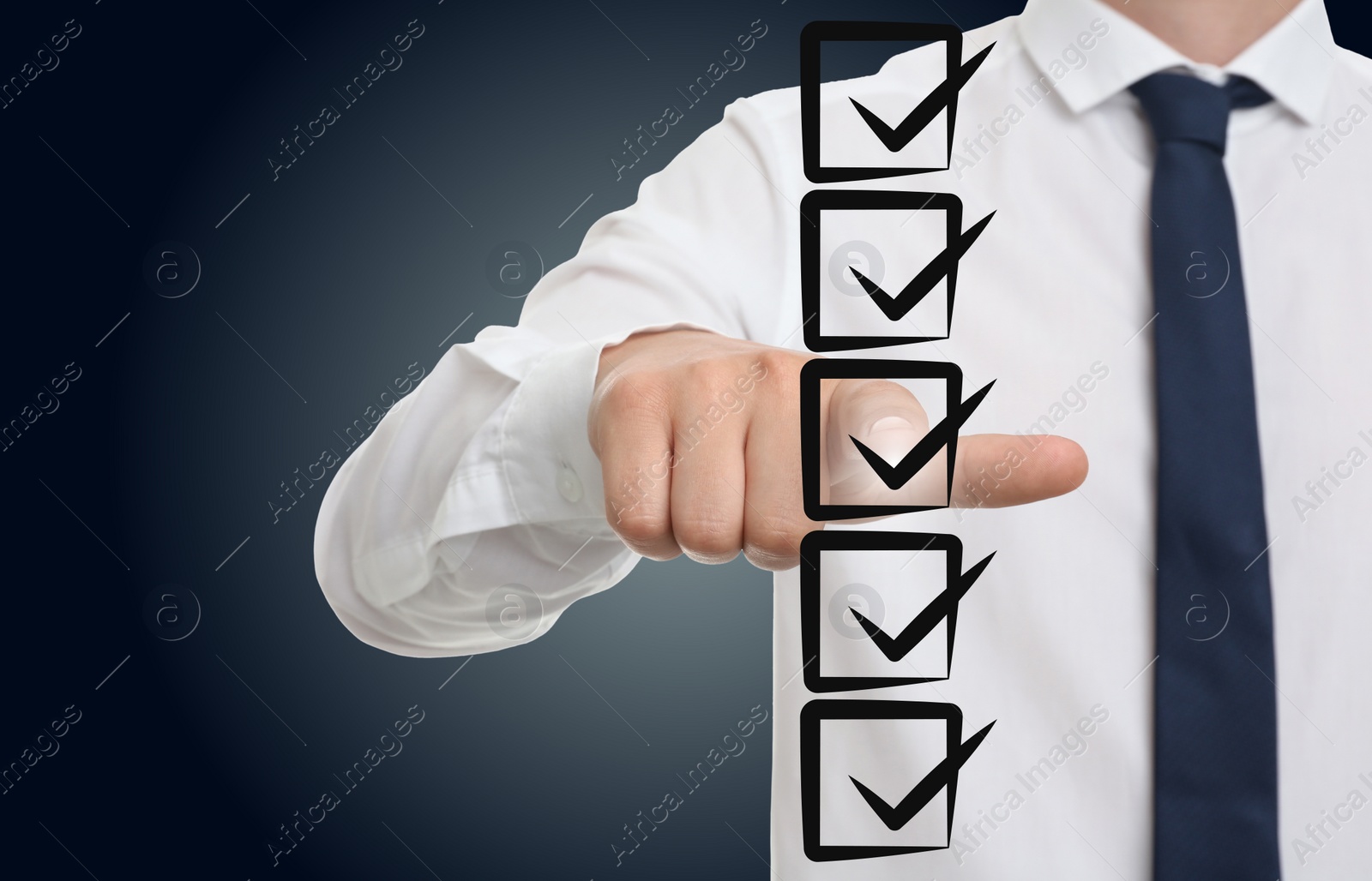 Image of Man pointing at check boxes with marks on virtual screen, closeup