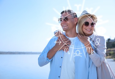 Image of Horoscope compatibility. Loving couple outdoors and zodiac wheel