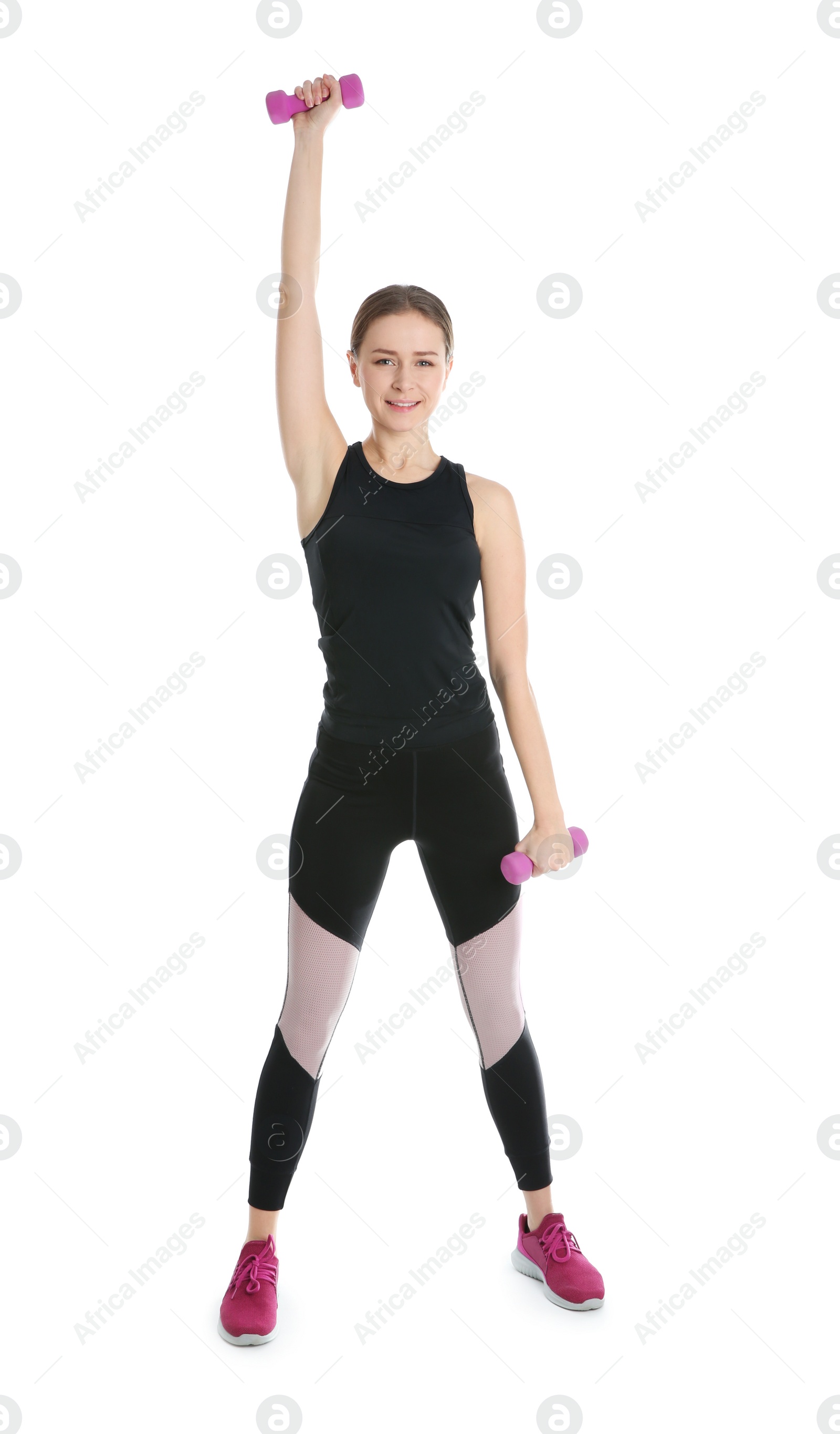 Photo of Young woman doing sports exercises isolated on white. Home fitness