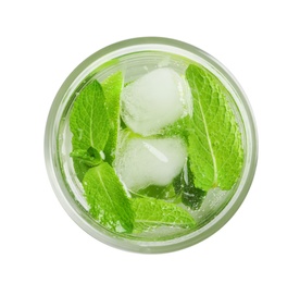 Photo of Refreshing beverage with mint and lime in glass on white background, top view