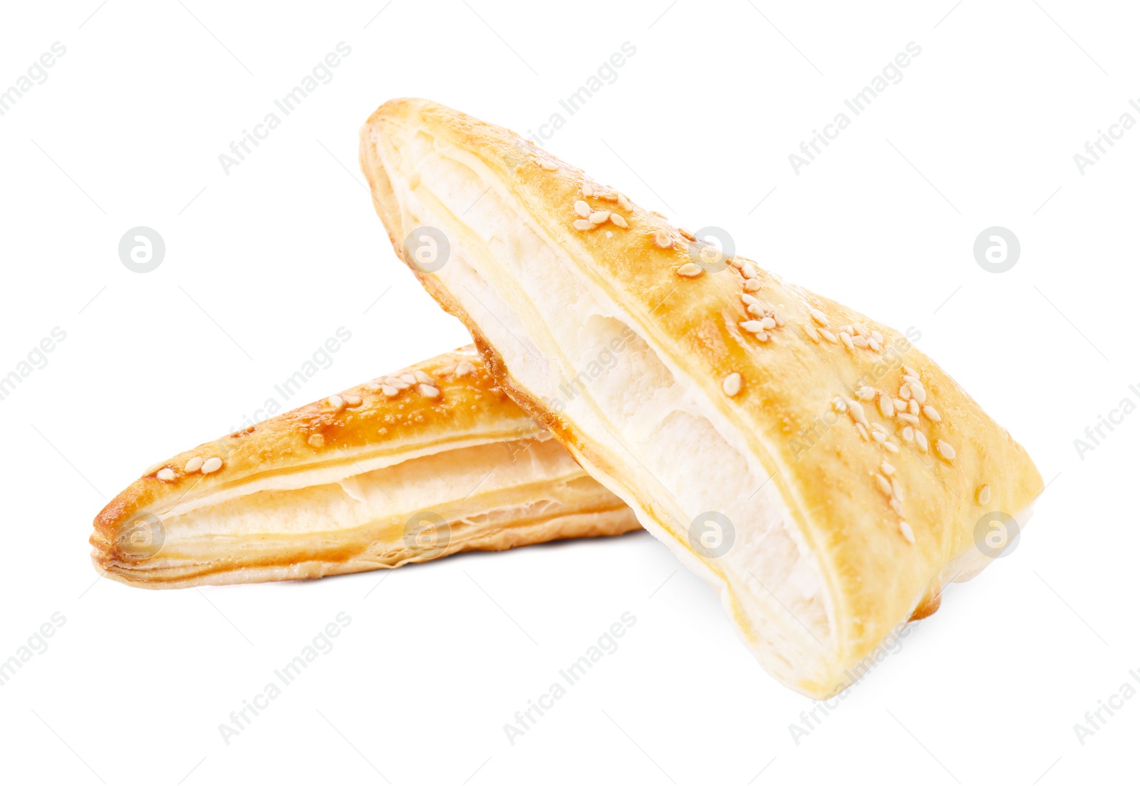 Photo of Delicious fresh puff pastries isolated on white