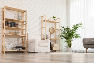 Wooden storage in stylish living room. Idea for interior design