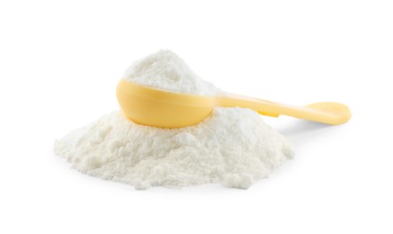 Photo of Powdered infant formula and measuring scoop on white background. Baby milk