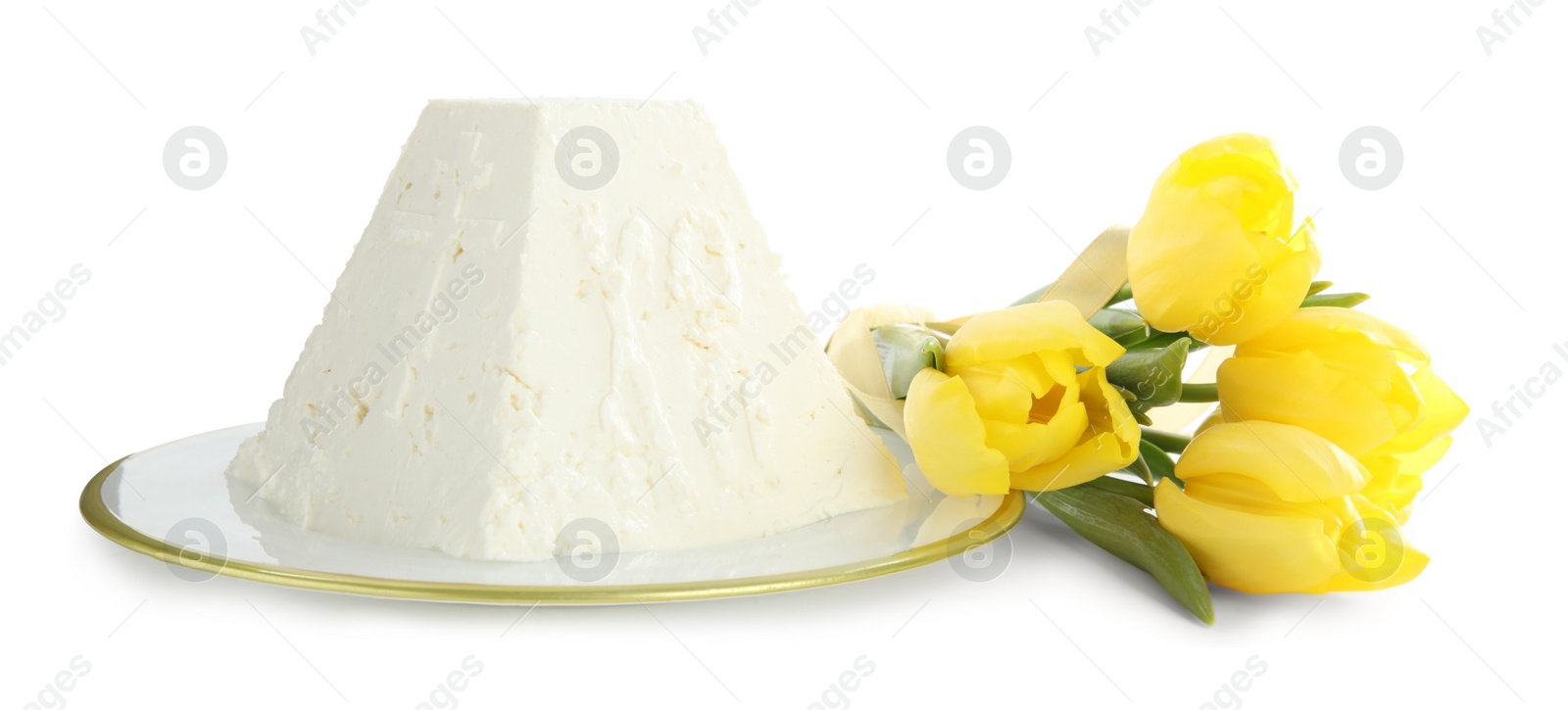 Photo of Traditional cottage cheese Easter paskha and yellow tulips on white background