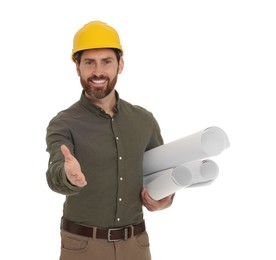 Photo of Architect in hard hat with drafts greeting someone on white background