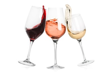 Image of Different types of wine splashing in glasses on white background