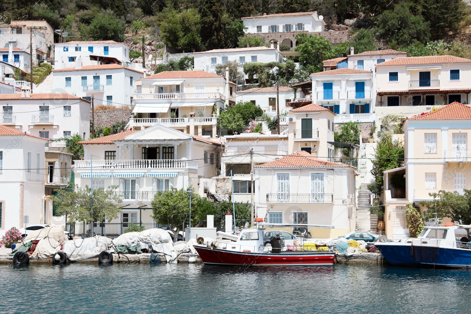 Photo of Beautiful view of sea coast with different boats on sunny day