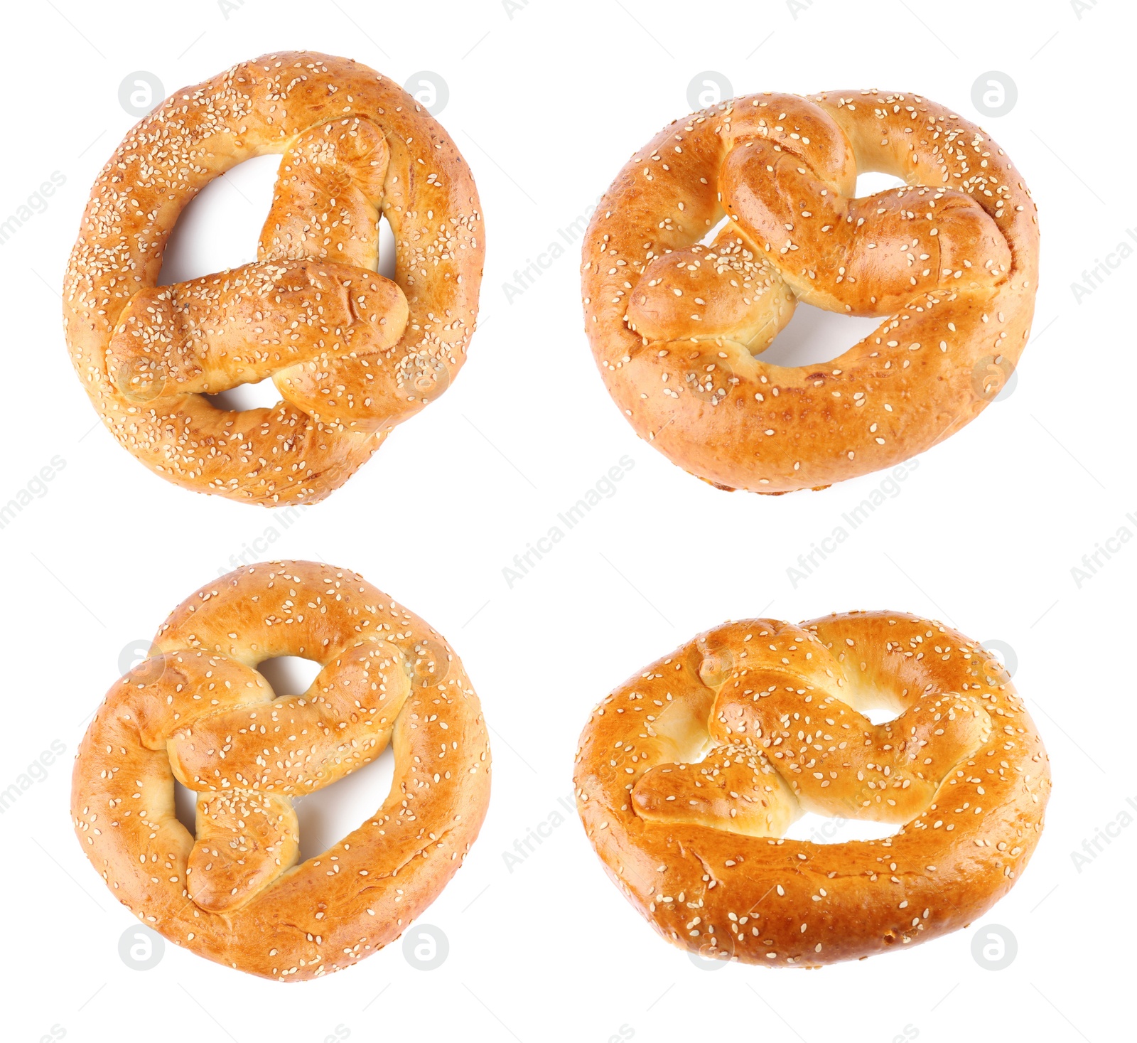 Image of Set with tasty freshly baked pretzels on white background