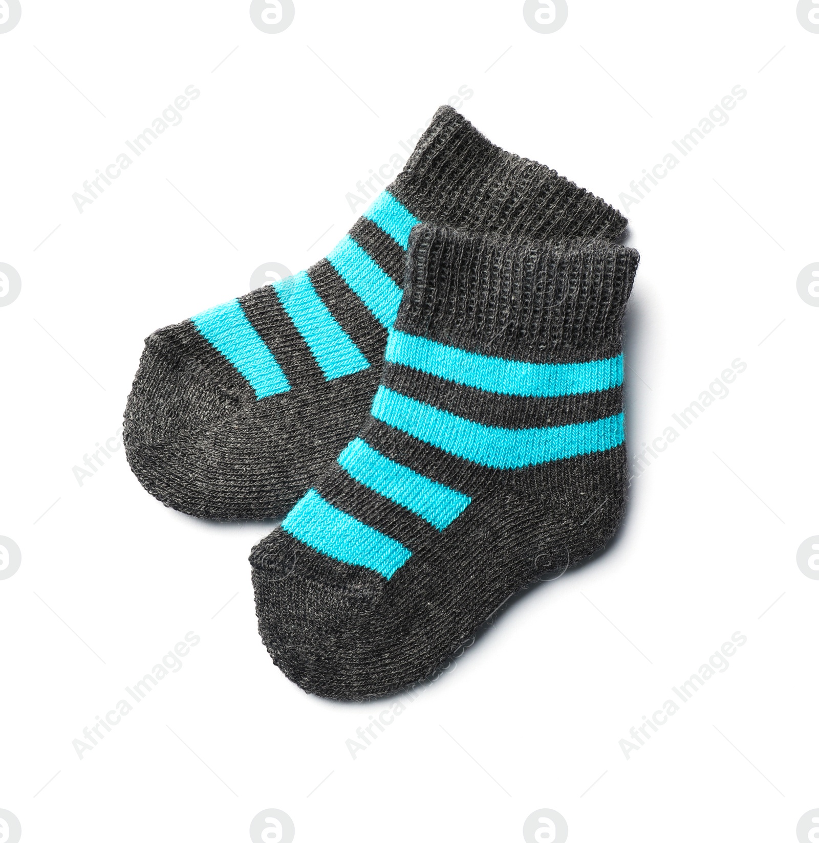 Photo of Cute child socks on white background, top view