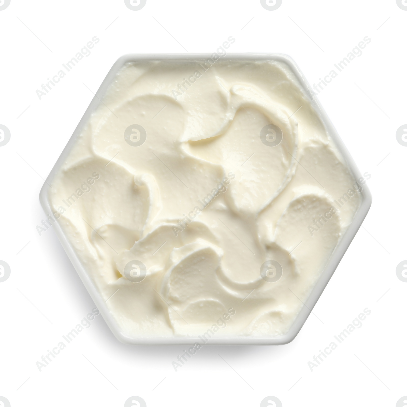 Photo of Bowl of tasty cream cheese on white background, top view