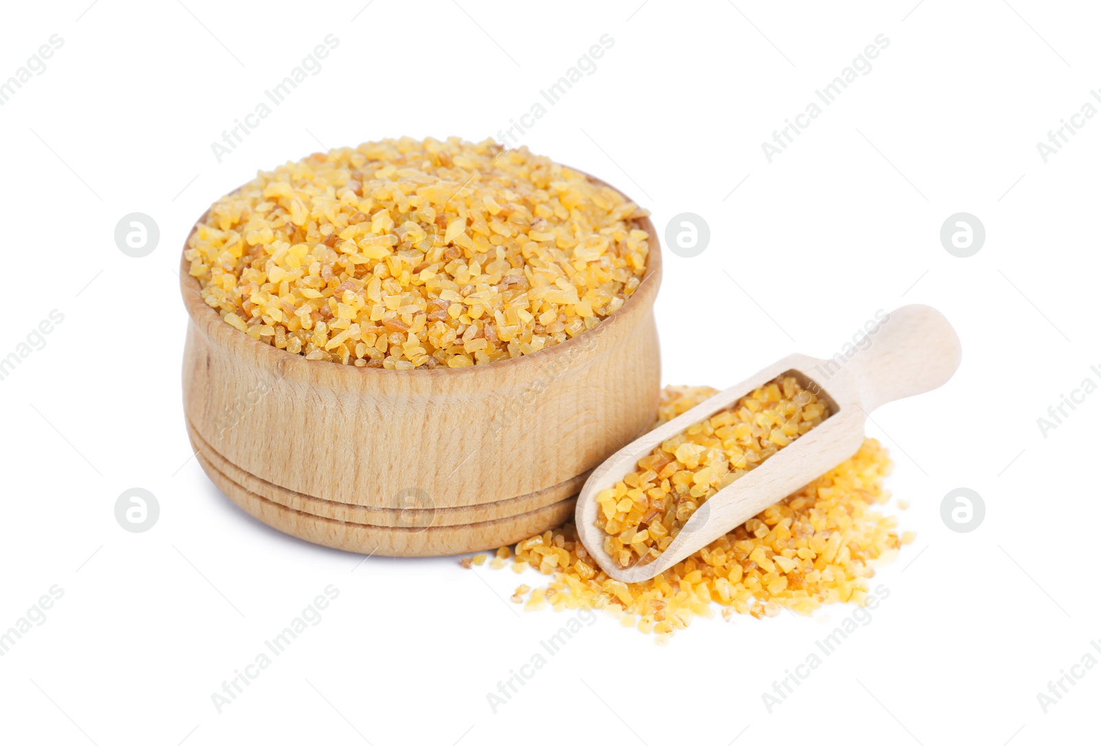 Photo of Wooden bowl and scoop with uncooked bulgur on white background