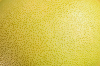 Photo of Fresh exotic pomelo fruit as background, closeup