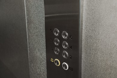 Elevator`s panel with call buttons in cabin, closeup