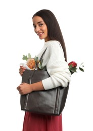 Young woman with leather shopper bag on white background