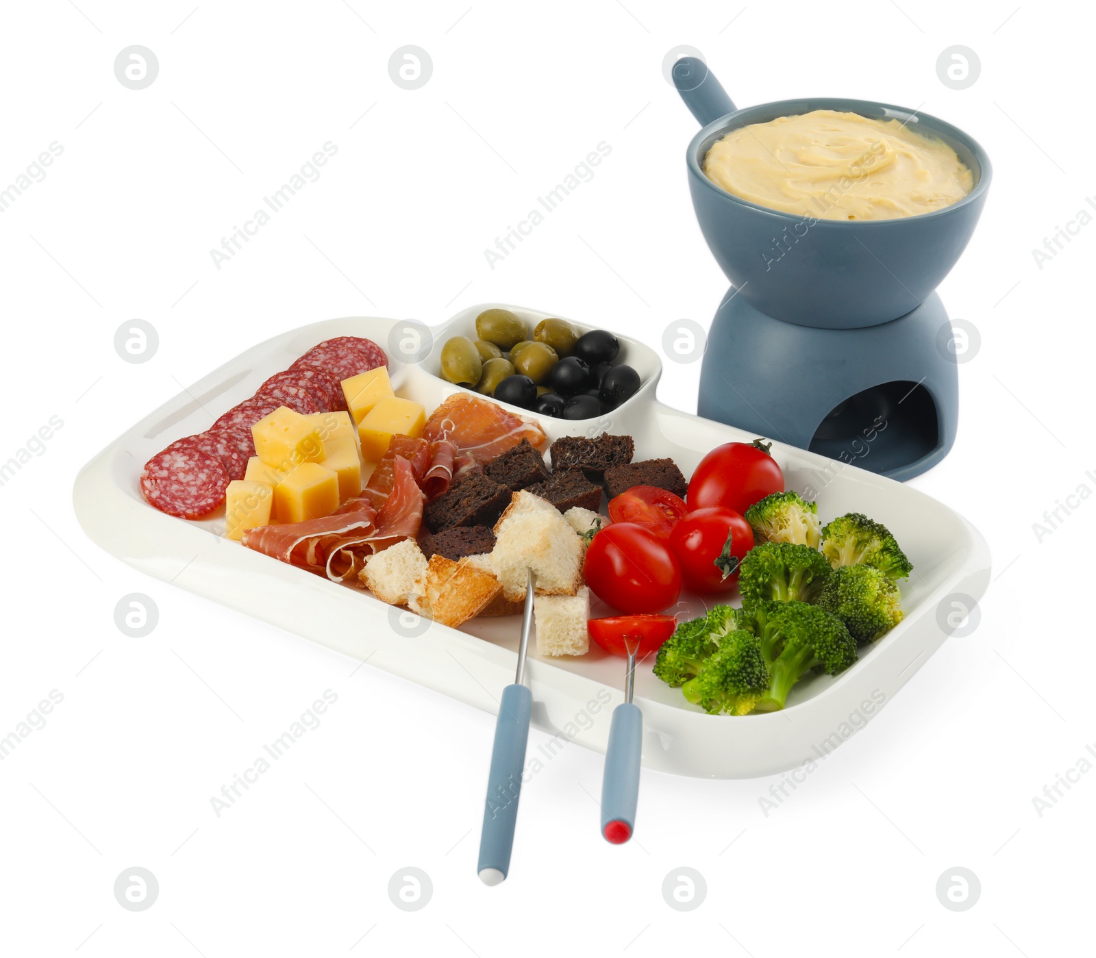 Photo of Fondue with tasty melted cheese, forks and different snacks isolated on white