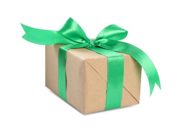 Photo of Christmas gift box decorated with green bow isolated on white
