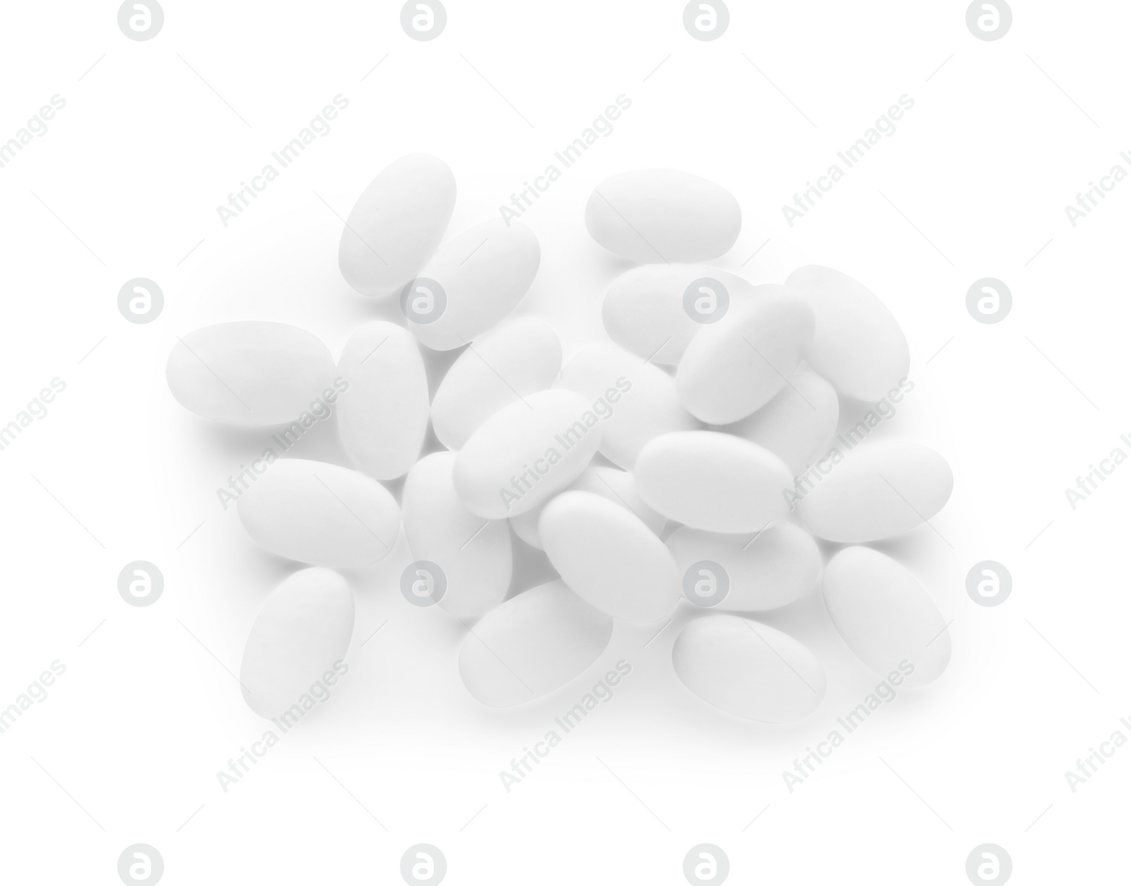 Photo of Tasty mint candies on white background, top view