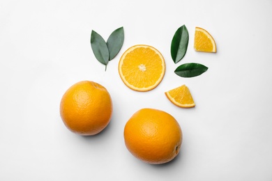 Photo of Flat lay composition with fresh oranges on white background