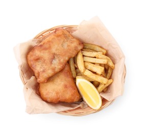 Photo of Tasty fish, chips and lemon in wicker bowl isolated on white, top view