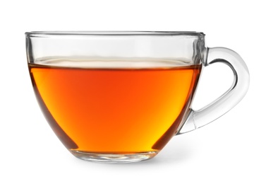 Glass cup of hot aromatic tea on white background