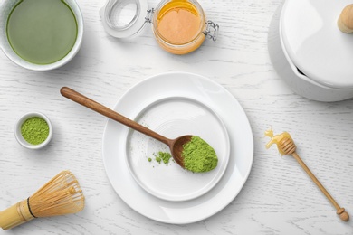 Flat lay composition with matcha tea on light background