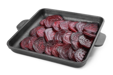 Photo of Baking dish with roasted beetroot slices isolated on white