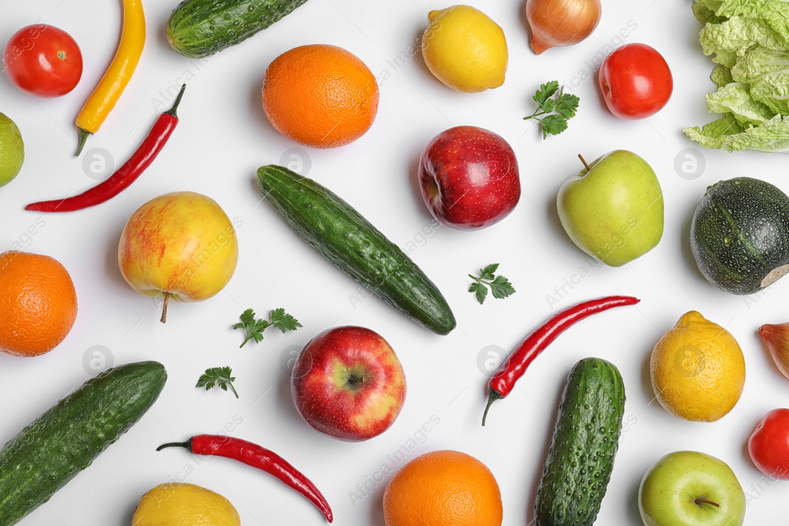 Photo of Flat lay composition with ripe fruits and vegetables on white background