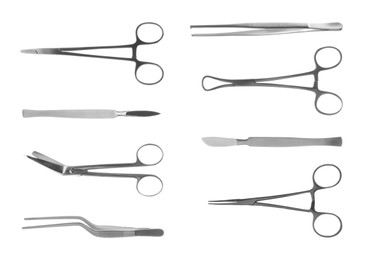 Image of Set with different surgical instruments on white background