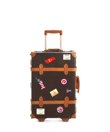 Image of Retro suitcase with travel stickers on white background