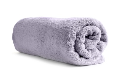 Rolled soft terry towel on white background