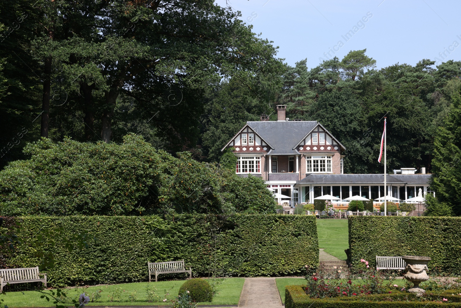 Photo of Ermelo, Netherlands - July 20, 2022: Luxury hotel Het Roode Koper and beautiful plants