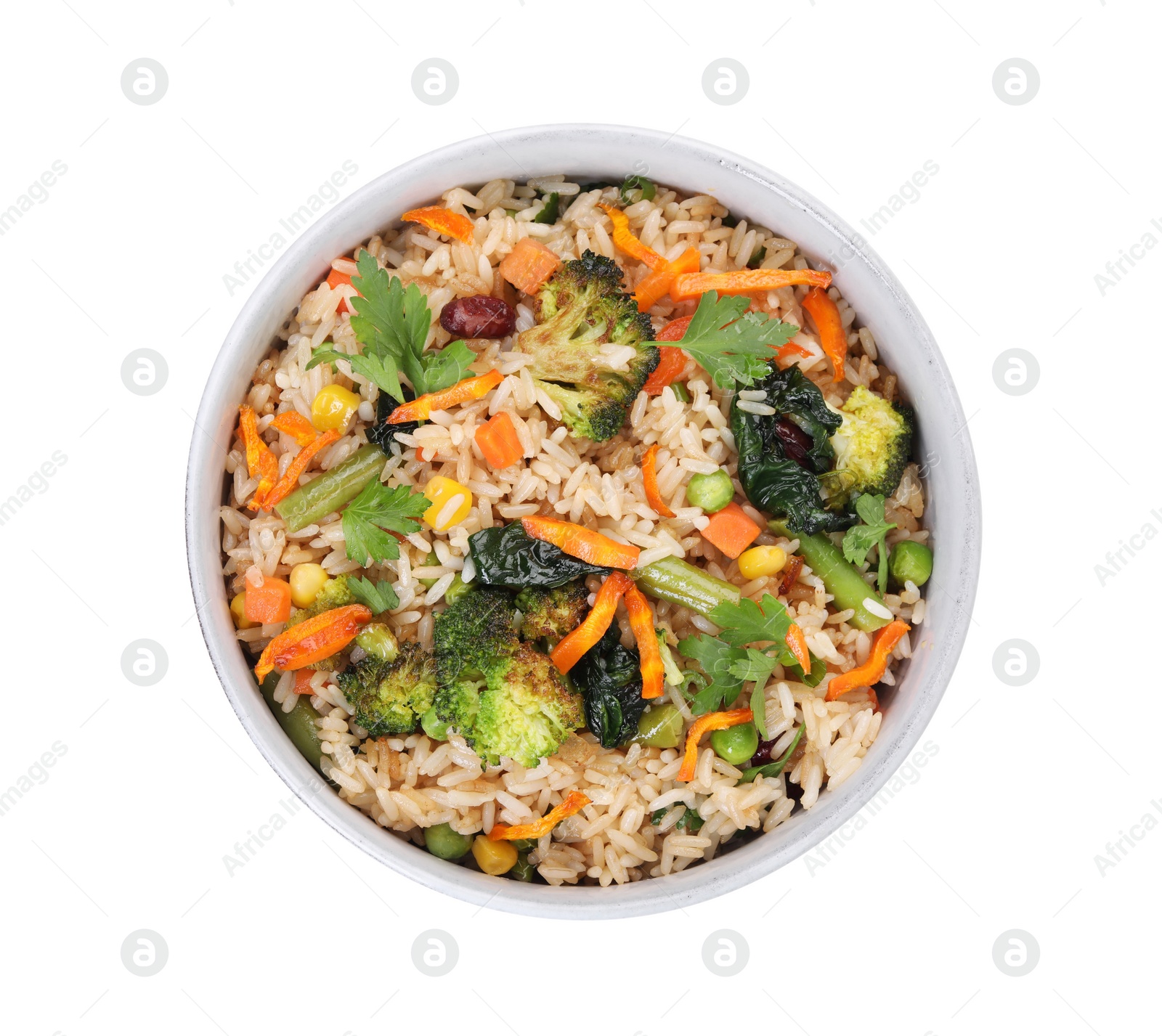 Photo of Tasty fried rice with vegetables in bowl isolated on white, top view