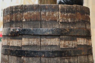 Traditional wooden barrel outdoors, closeup. Wine making