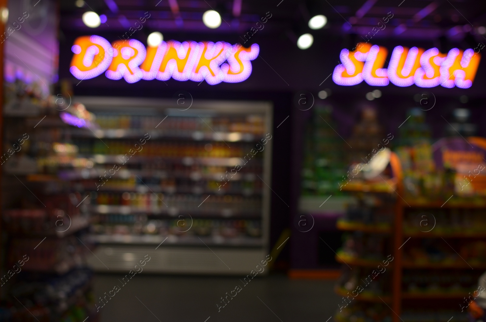 Photo of Blurred view of supermarket interior with different products