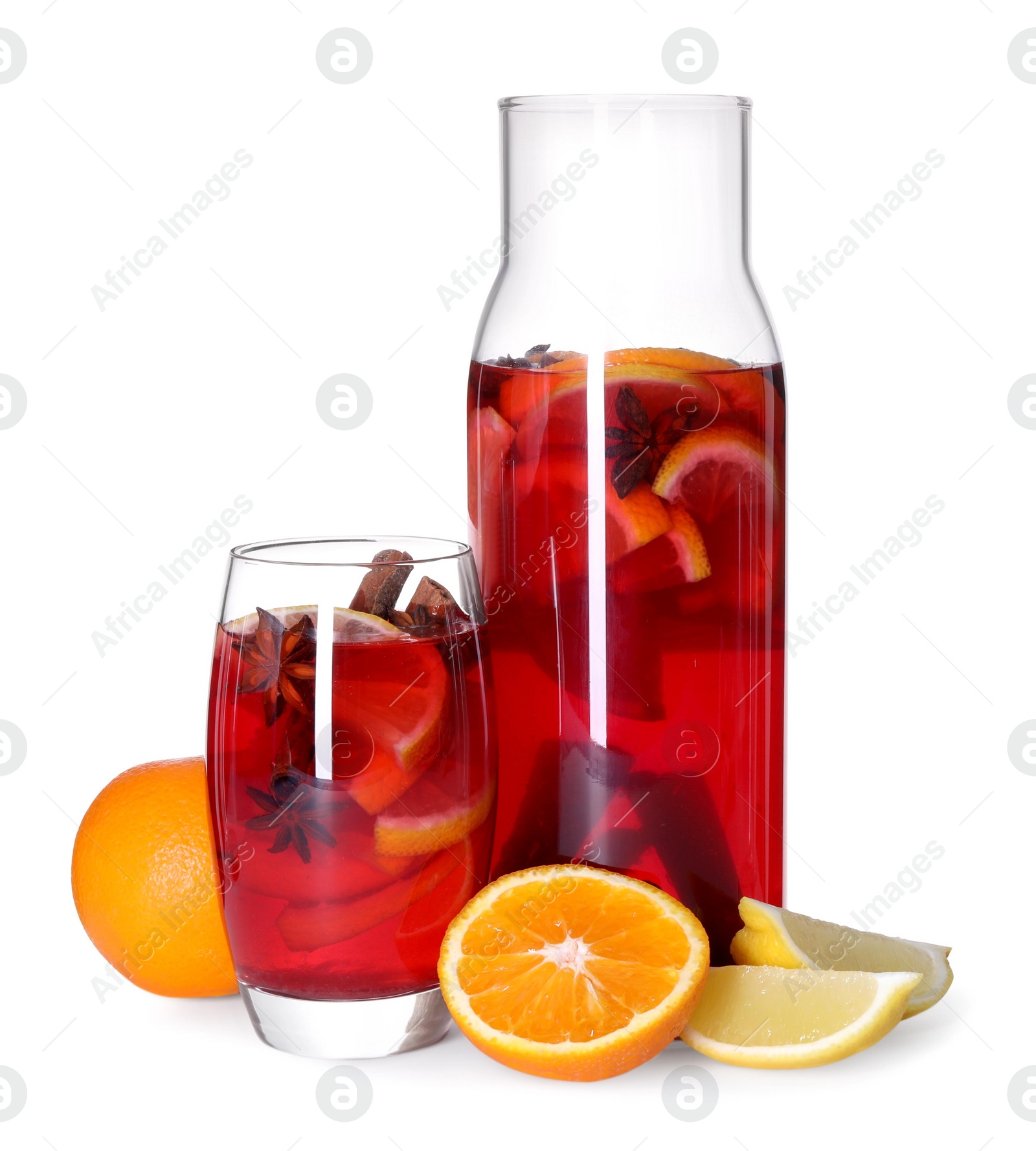 Photo of Tasty punch drink and ingredients isolated on white