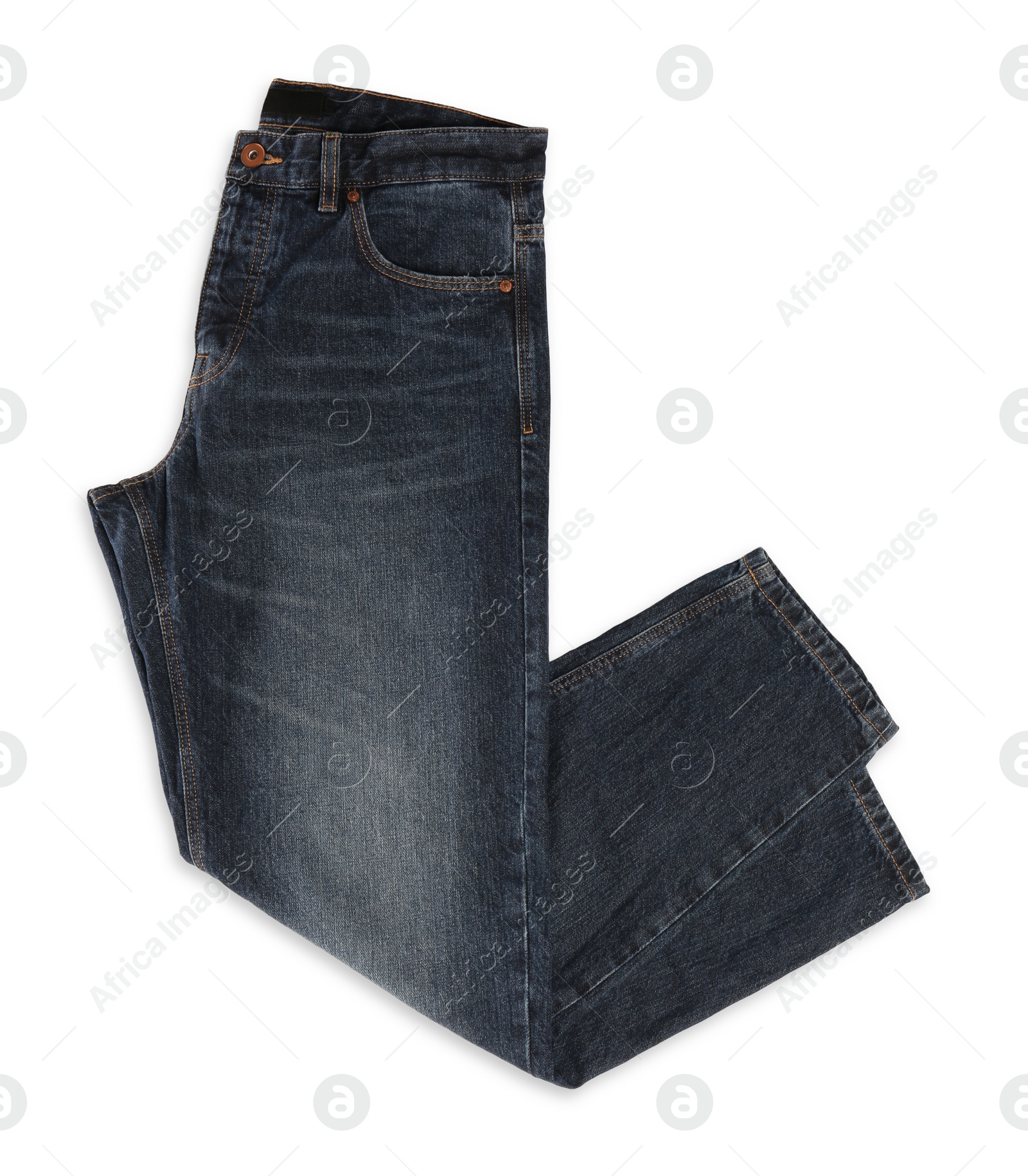 Photo of Stylish dark blue jeans isolated on white, top view