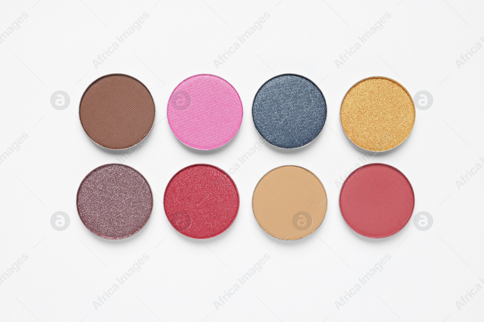 Photo of Different beautiful eye shadows on white background, flat lay