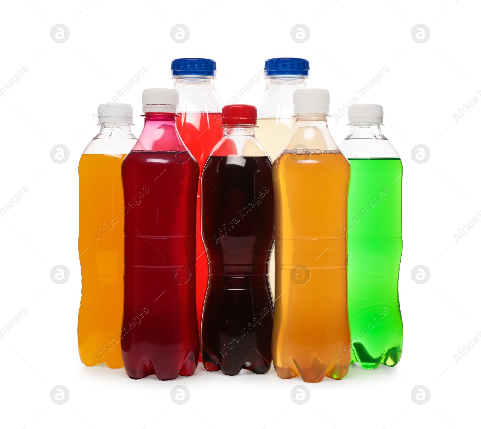 Photo of Bottles of soft drinks on white background