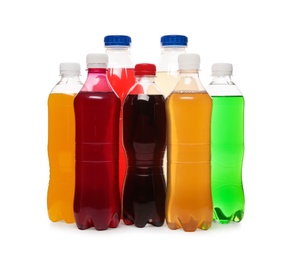 Photo of Bottles of soft drinks on white background