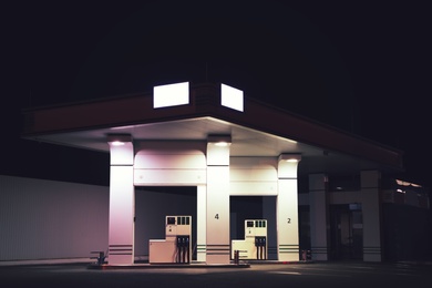 Photo of View of modern gas station at night outdoors