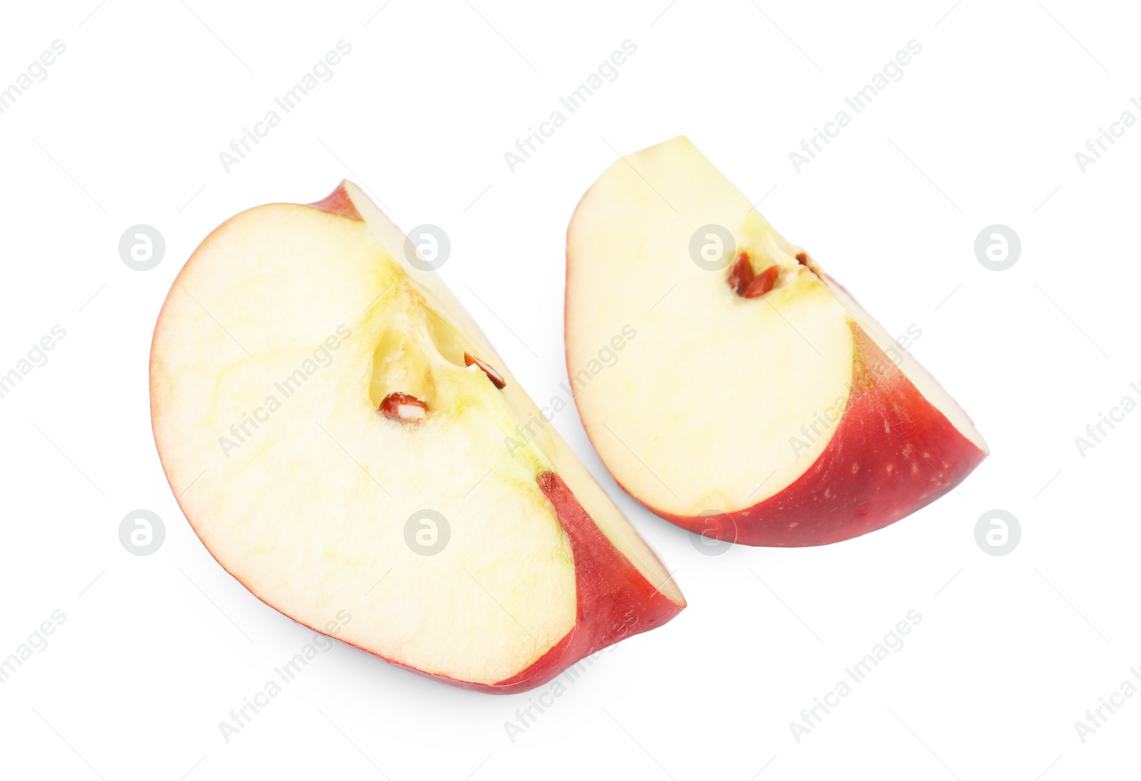 Photo of Pieces of ripe red apple isolated on white