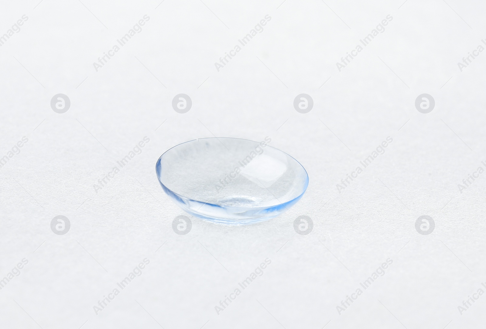 Photo of Contact lens on light background