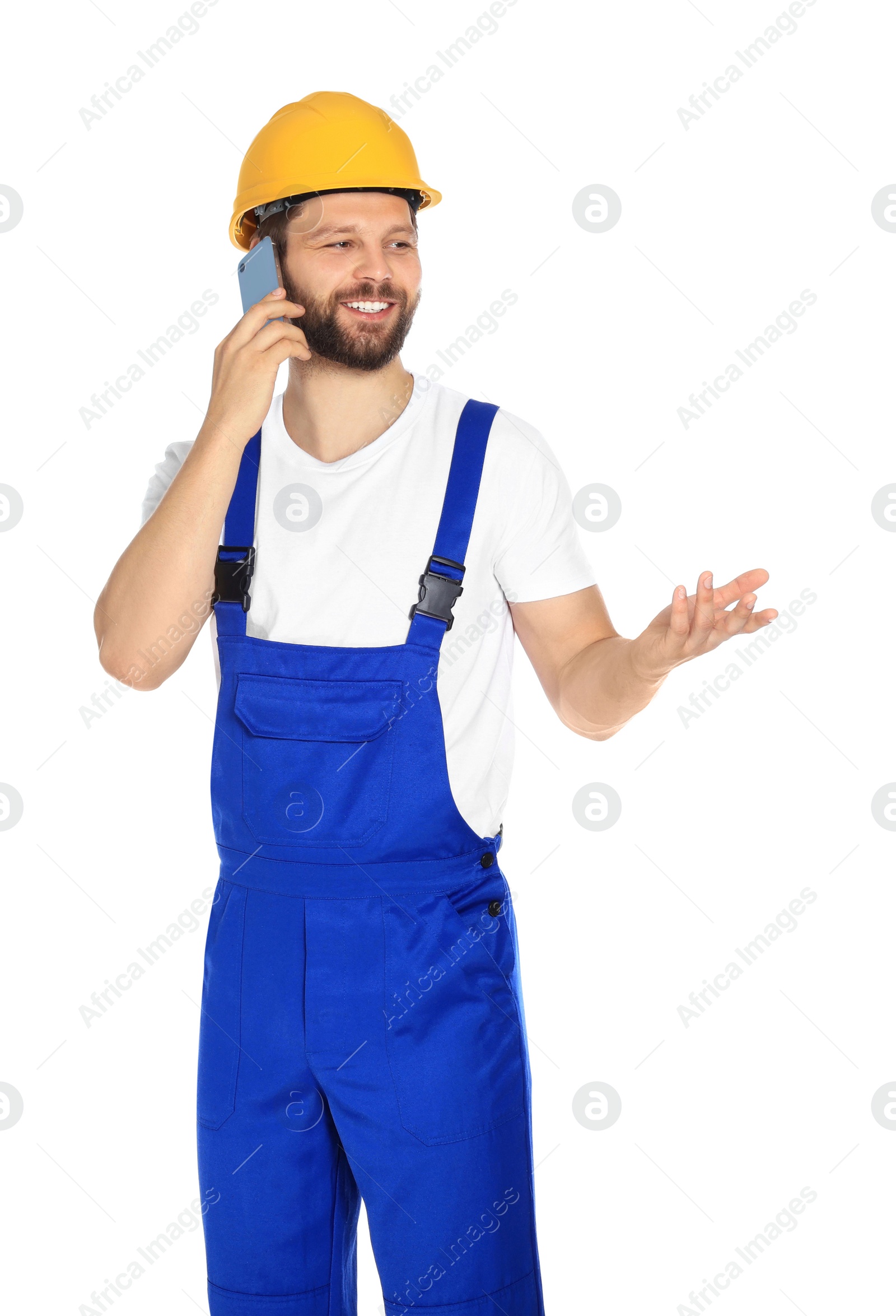 Photo of Professional repairman in uniform talking on smartphone against white background